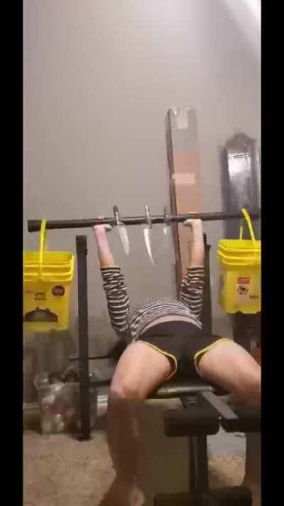 Trying to impress a girl by benching a diy killing contraption.