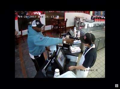 Man robs Jimmy Johns cashier at gun point and cashier isn’t fazed at all.