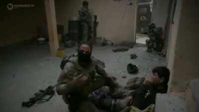 Iraqi Golden division try to save a guy while they are being pinned down by a sniper