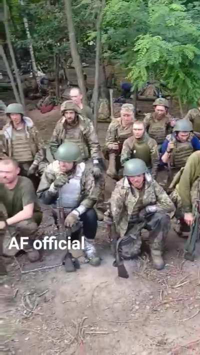 Ukrainian conscripts take the military oath of allegiance.