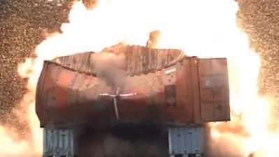 Centauro 120mm takes out a shipping container