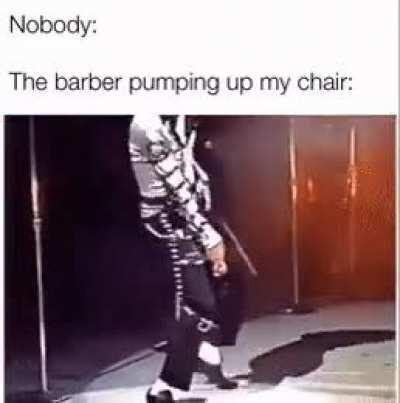 Barber pumping up my chair