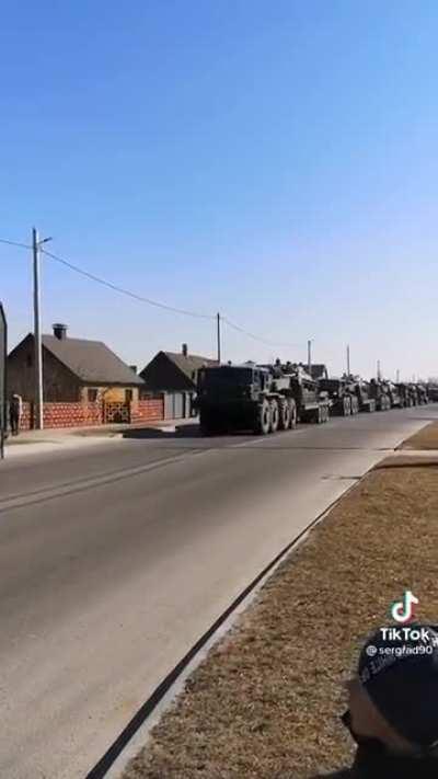 This video is from yesterday and it apparently shows a Belarusian convoy moving towards Ukraine.