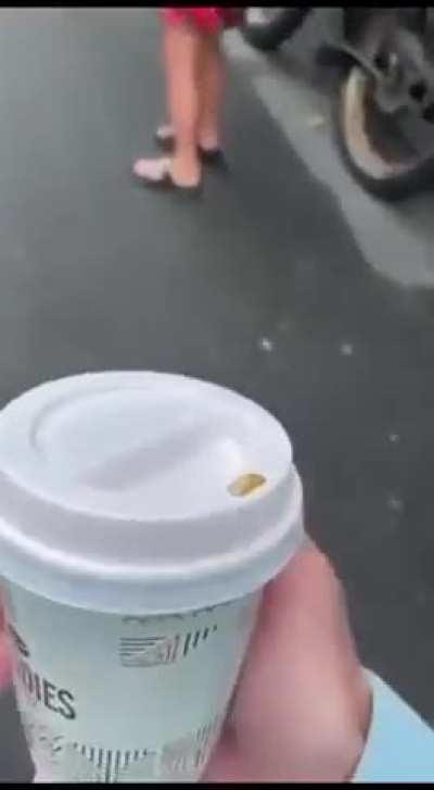 Guy talks about coffee as he walks up to a beat down at a pub.