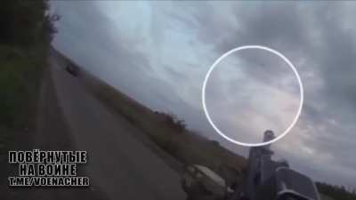 A Russian soldier on an ATV shoots down a Ukrainian FPV hunting him. Location unknown - August 2024