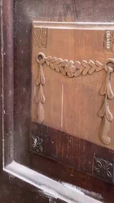 Cleaning wood using a laser