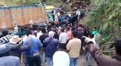 In a village in Nagaland (India) the entire community pulls up a truck which fell off the road with ropes &amp;amp; the spirit of unity!