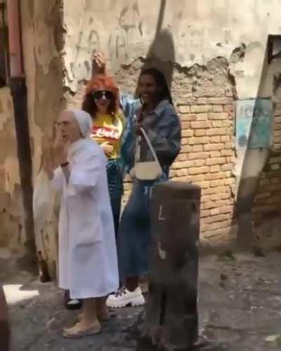 Nun pulls apart girls kissing during photo shoot in Naples. (whew wee can't wait to read the comments on this one if it goes front page!)