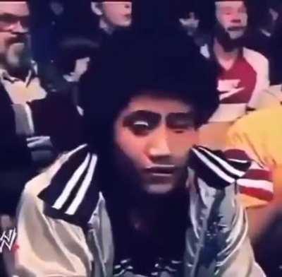 11 year old Dwayne &quot;The Rock&quot; Johnson sitting in the crowd watching his father about to wrestle, 1984.