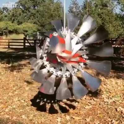 The way this metal contraption moves so smoothly while being powered only by wind