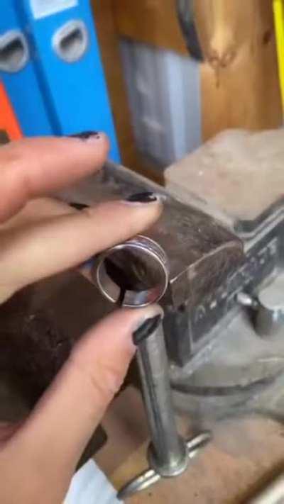 Making rings out of cutlery.