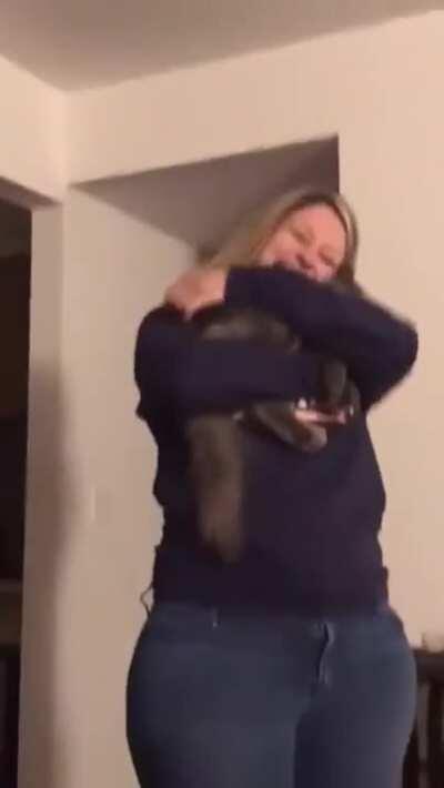 Kitty's adorable way of jumping into her human's arms