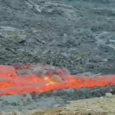 What happens when a boulder falls into lava