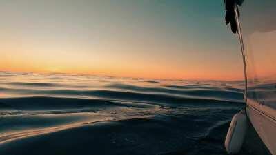 Bobbing in a boat on the Pacific watching the sunset