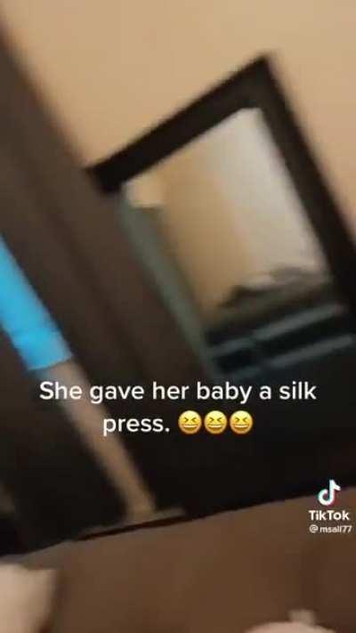 Giving your doll a silk press