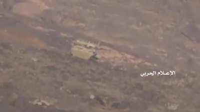 Houthi fighters force a Saudi LAV II IFV to retreat under persistent fire from an anti-materiel rifle. Najran, Saudi Arabia