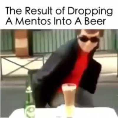 What happens when you drop a mentos into beer.