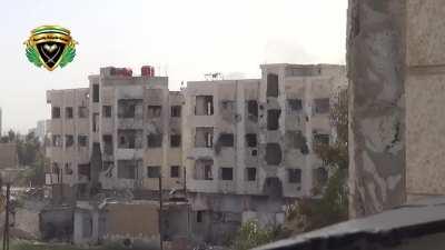 Ahl al-Athar Brigade engineers undermine an SAA occupied building, sinking it with a tunnel bomb - Jobar, Damascus - 2014