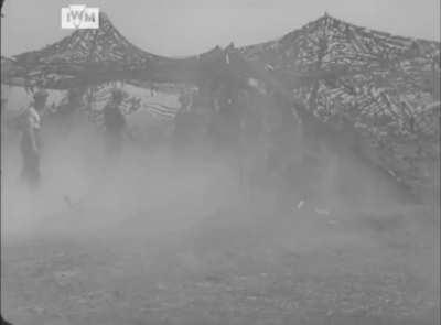 155mm &quot;Long Tom&quot; heavy guns belonging to the 52nd (Bedford Yeomanry) Heavy Regiment RA are seen trying to bomb German heavy Mortars belonging to units delaying 7th Armoured Division's advance towards Aunay-sur-Odon. 1944 WWII