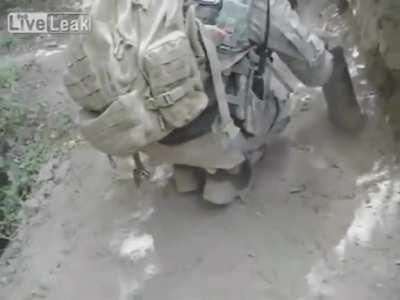 U.S. Army soldier accidentally picks up IED in Afghanistan. A soldier picks up what looks to be an old artillery shell. After realizing the whole thing was rigged with wiring, he quickly runs away.