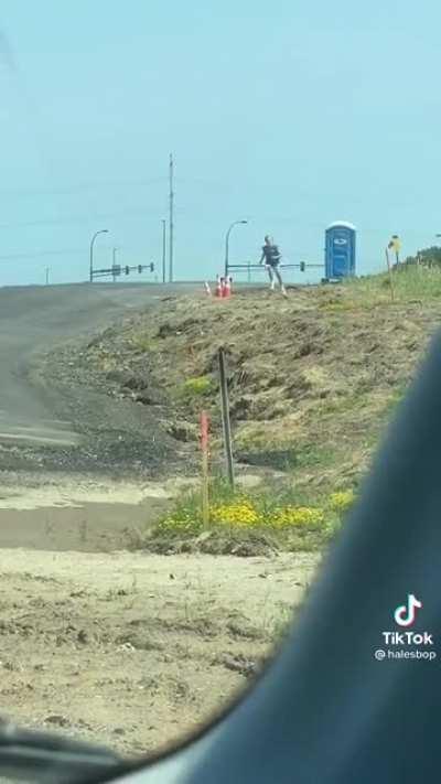 Using a portapotty during a traffic jam