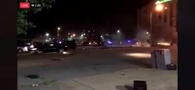 Video footage captures police under fire during riots in St. Louis last night. 4 officers were injured in the exchange and the suspect(s) remain at large.