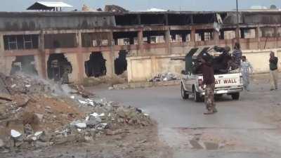 FSA fighters using a Great Wall pickup as a ZPU-2 platform to engage SAA positions - Daraa al-Balad - 11/12/2013