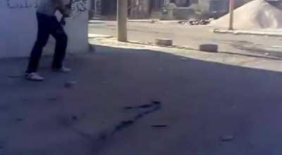 Syrian rebel sneaks up and engages a tank from extremely close range