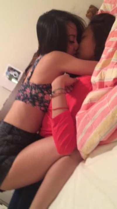 Asian Girls Make Out on the Bed During Party