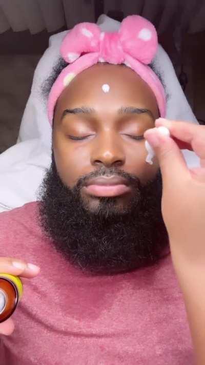 Wife gives husband a thorough skin care routine