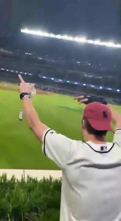 Playing beer pong at a baseball game