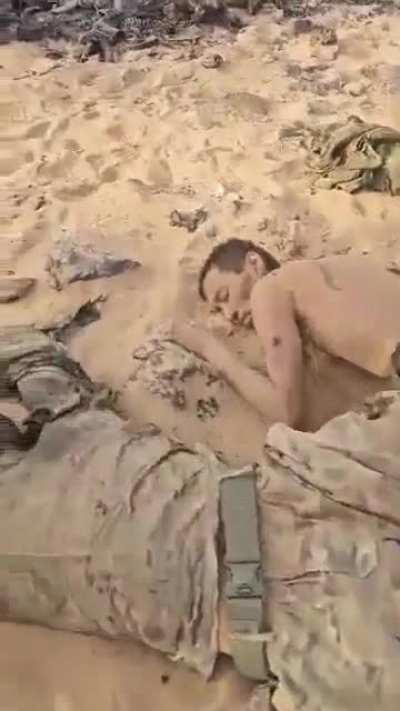 Dead Wagner Group members and destroyed equipment after they got ambushed in Mali