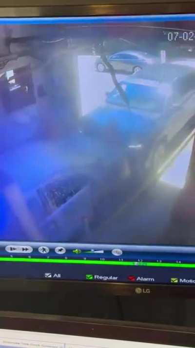 Girl squished between 2 cars in car wash
