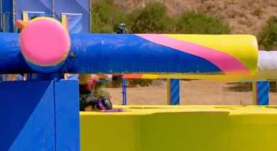 Girl folds in half on wipeout