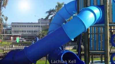 Freddie Mercury gets trapped in a slide and calls out for mama.