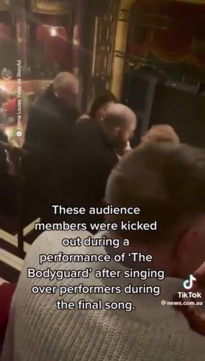 Audience members get dragged out after singing at the top of their lungs during a Theater Performance