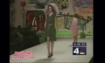 Clip of a model falling down causes two news hosts to break into a wheezing laughing fit