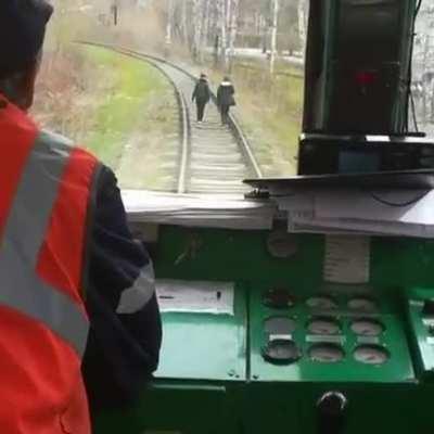 Walking on the train tracks.