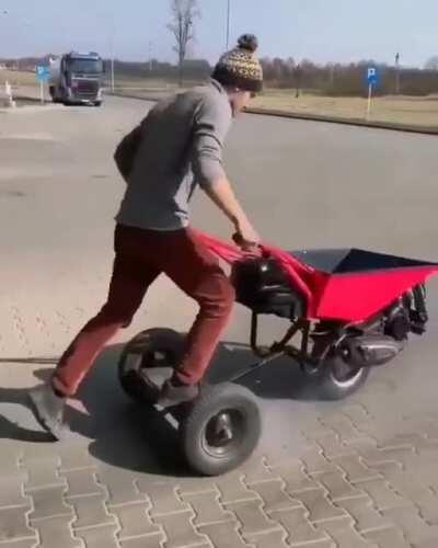 This wheelbarrow wheels you in Russia.