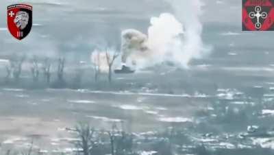 Drone footage of an attack by the Ukrainian 63rd Mechanized Brigade on a Russian tank driving alone through the fields of southern Ukraine. The tank turns into a flaming inferno quickly and only one burning Russian crewman seems to be able to escape the v