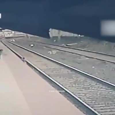 In India, a switchman rescued a boy, nearly hitting a train.