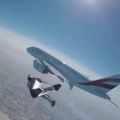 Jetman flying next to the Emirates A380 in Dubai.