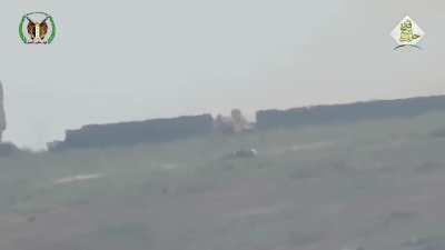 FSA BGM-71 TOW team targets an SAA armored vehicle positioned at a gap in a wall - Handarat, Aleppo Front - 4/14/2016