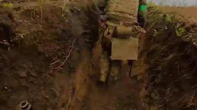 Ukrainian soldiers moving forward in the direction of Melitopol. Footage reportedly from a recently captured Russian trench.