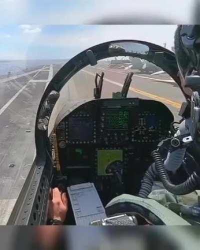 F18 takeoff from an aircraft carrier.