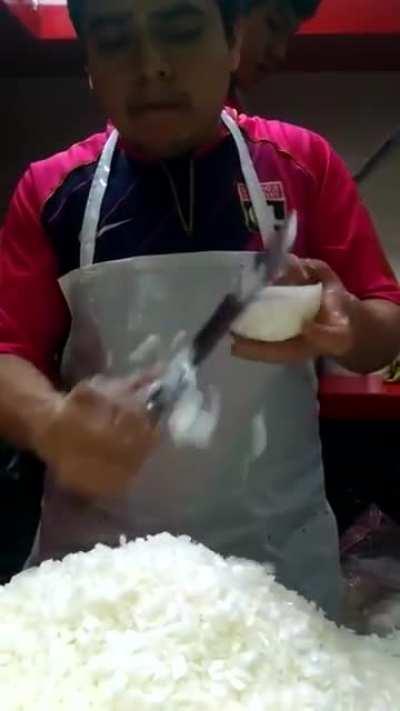 Guy cutting an onion