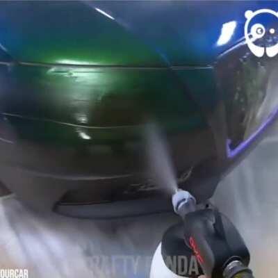 Spraying a car with pearlescent paint