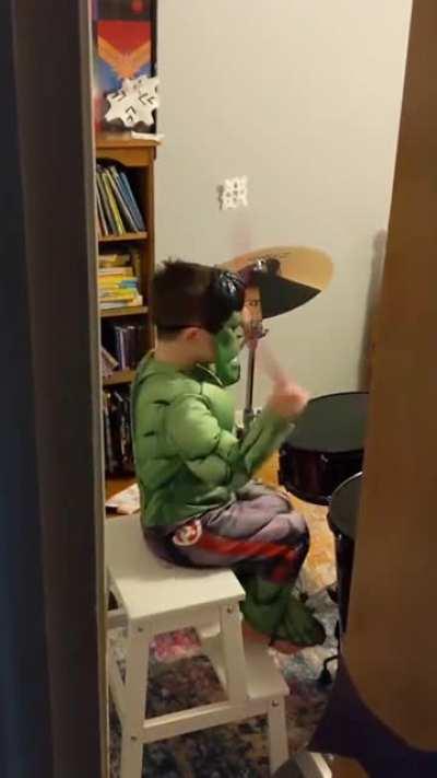 He was supposed to be taking a nap. I'm in the kitchen and start hearing drums.