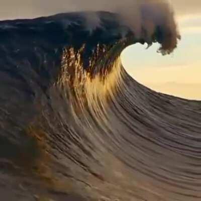 Wave drags cloud into the sea