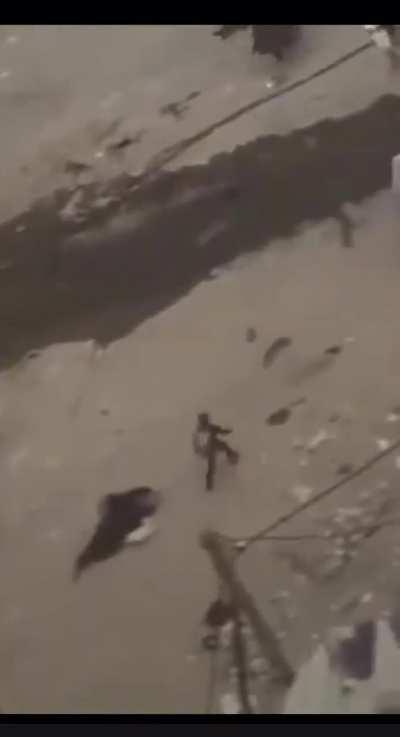 Women waving white flag taken out by Israeli sniper